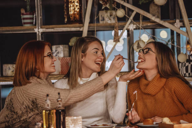 istock Mother feeding daughter with appetizer 1137175070