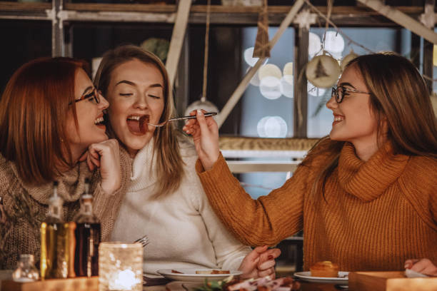 istock Women having a fun lunch 1137175072