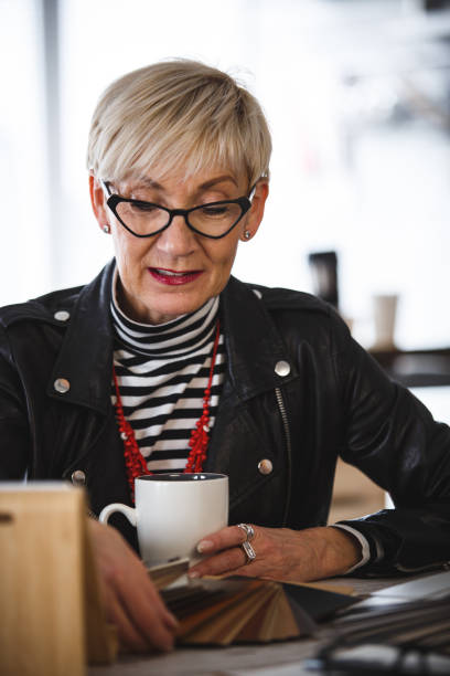 istock Woman looking at color samples 1137175339