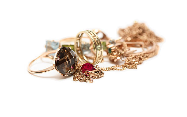 istock Gold Jewelry On White 113717637