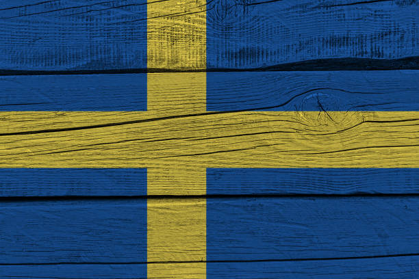 istock Sweden flag painted on old wood plank 1137177808