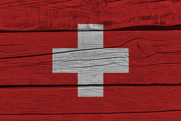 istock Switzerland flag painted on old wood plank 1137177810