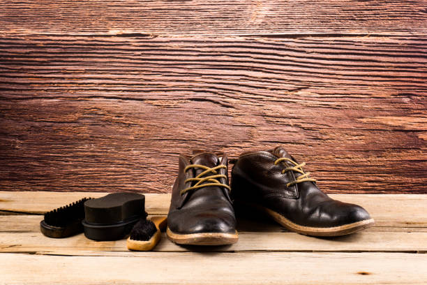 istock old leather shoes for winter on a wood 1137180584