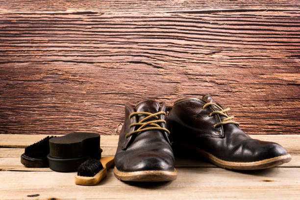 istock old leather shoes for winter on a wood 1137180621