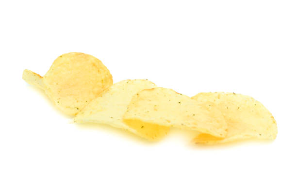 istock potato chips closeup isolated on a white background 1137185178