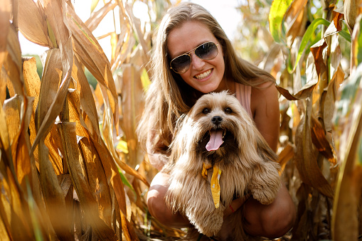 Woman with her dog in nature.