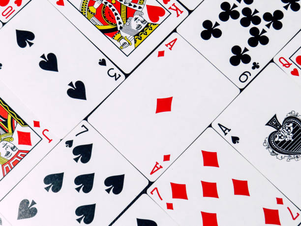 istock Various pokers cards in black background 1137188963