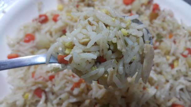 istock Basmati Rice Pulao or pulav with Peas, or vegetable rice using green peas also known as matar pulao background 1137220680