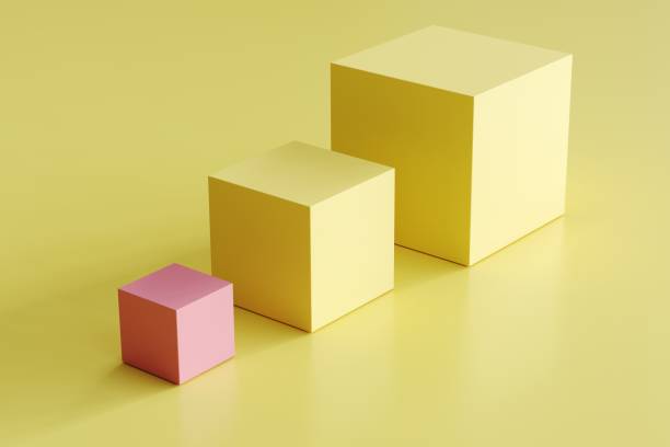 istock outstanding pink box and yellow boxes in different sizes on yellow background. minimal concept idea 1137232341