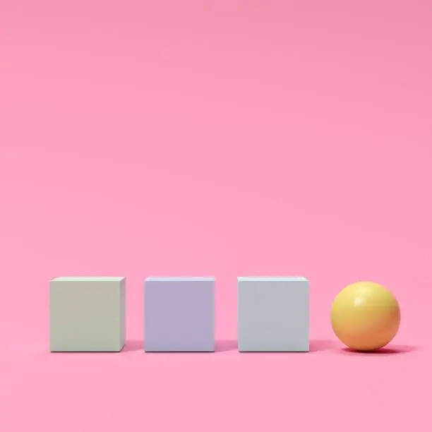 Photo of colorful boxes and a yellow sphere on pink background. minimal concept idea