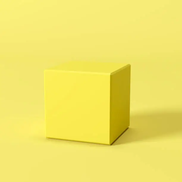 Photo of yellow box on yellow background. minimal concept idea