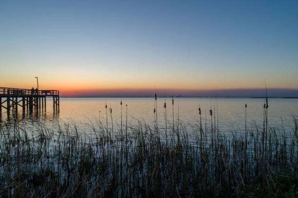 Sunset at Bayfront Park Sunset on Mobile Bay in Daphne, Alabama USA mobile bay stock pictures, royalty-free photos & images