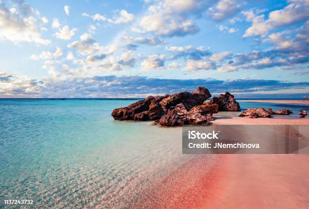 Crete Skyline Elafonissi Beach With Pink Sand Against Blue Sky With Clouds On Crete Greece Stock Photo - Download Image Now