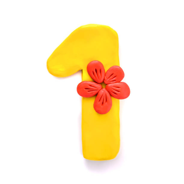 istock Number one 1 of yellow plasticine 1137246162
