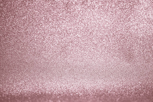 istock Rose gold glitter texture. Festive sparkling sequins background closeup. 1137253580