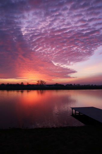 Purple colored sky gives the lake a fantastic glow