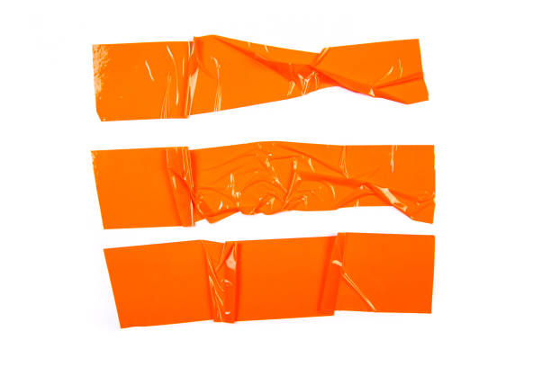 istock Set of orange tapes on white background.  - Image 1137268743