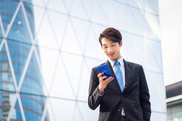 istock Asian businessman using his smartphone 1137271168