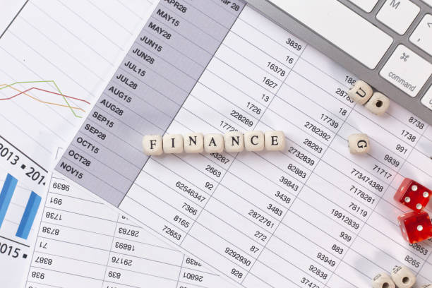 istock The finance word on wood cube business content image. 1137272335