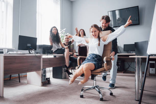 istock Happy young colleagues smile and have fun at the creative office. 1137272654