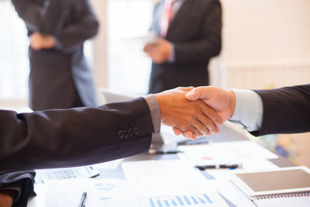 istock Business group or business partners discussing documents and ideas at meeting 1137273560