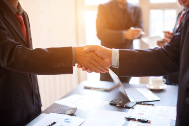 istock Business group or business partners discussing documents and ideas at meeting 1137273729