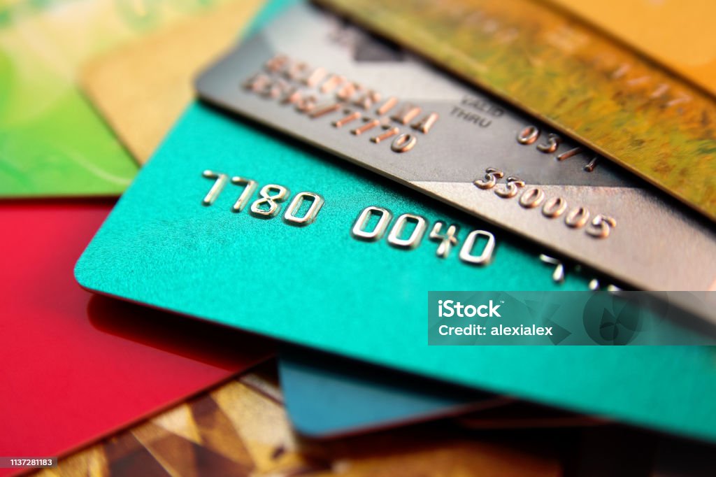 stack of multicolored credit cards, close up view with selective focus Credit Card Stock Photo