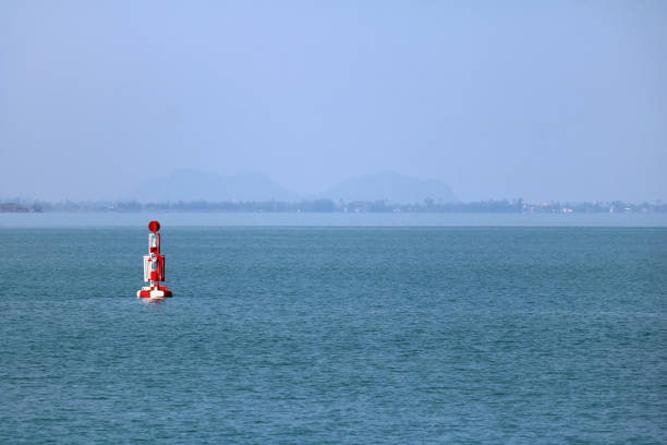 Red buoy Navigation or lateral Marks floating in the sea,Gulf of Thailand.