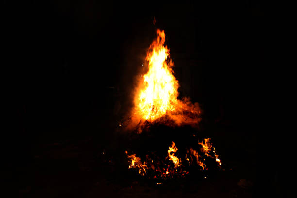 Burning funeral pyre of dead person stock photo