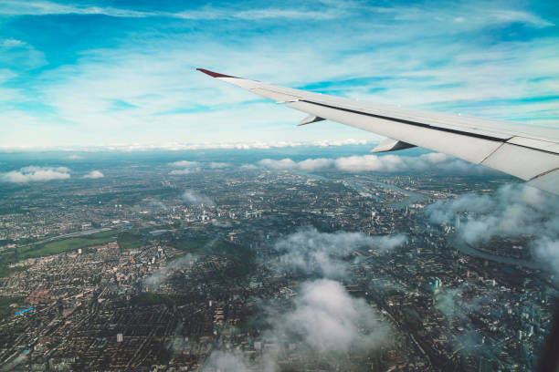 istock Plane wing - aerial view of London 1137284717