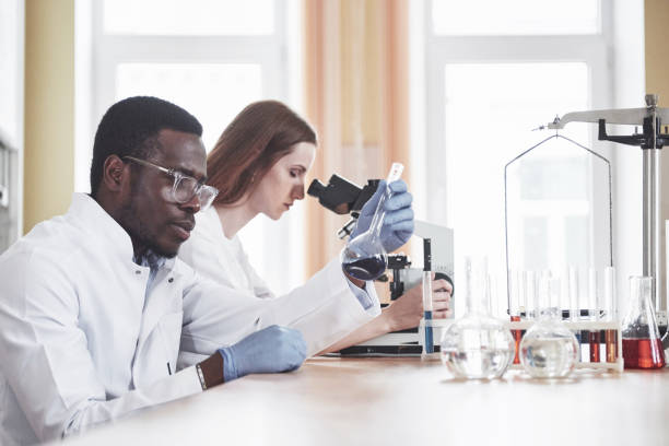 istock Scientists work closely with the microscope in the laboratory by conducting experiments and analyzes. 1137284743