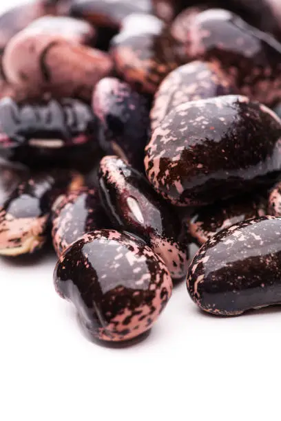 Many raw beans on white background