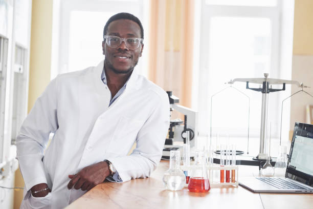 istock An African American worker works in a laboratory conducting experiments. 1137284845