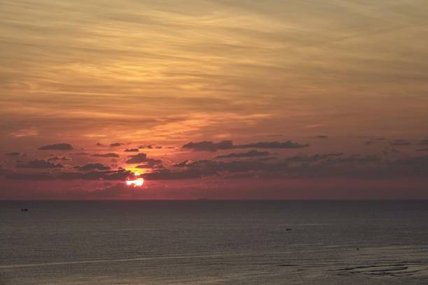 istock sunrise by the sea 1137287370
