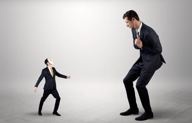 istock Conflict between small and big businessman 1137290805