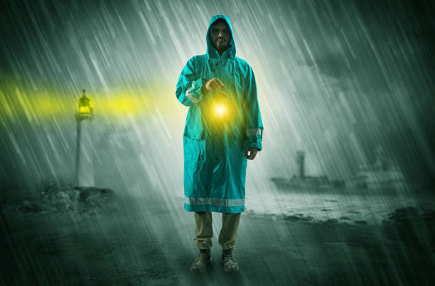 istock Man coming with lantern at coast concept 1137291370