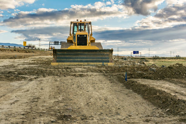 istock Excavator on the construction works of a highway 1137294352