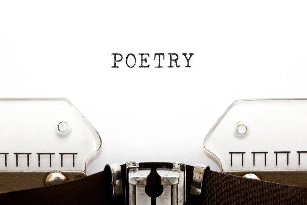 word poetry on retro typewriter - poem stock-fotos und bilder