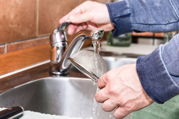 istock Close Up Man Hands Washing Kitchen Utensil (Sieve) in Sink 1137304678
