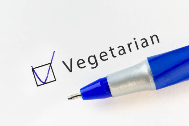 istock Vegetarian - checkbox with a mark on white paper with pen. Checklist concept. 1137304802