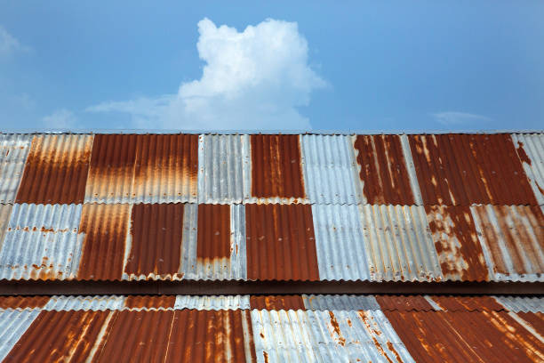 istock Old zinc roof and sky with clouds. 1137305349
