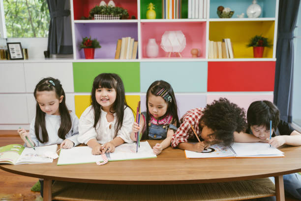 istock children friends education concept. 1137311676