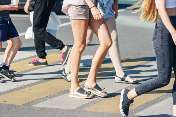istock pedestrians at a pedestrian crossing 1137318427