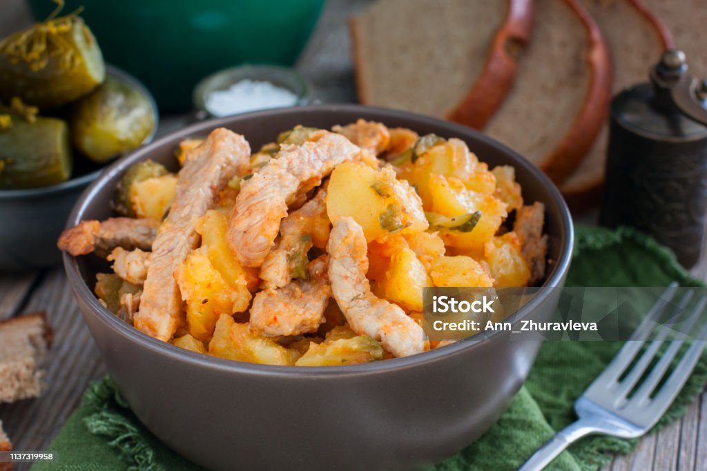 Azu - pork stew with potatoes and pickled cucumbers, horizontal Braised Stock Photo