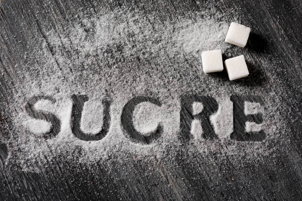 istock word sugar in French or Catalan written with sugar 1137320012