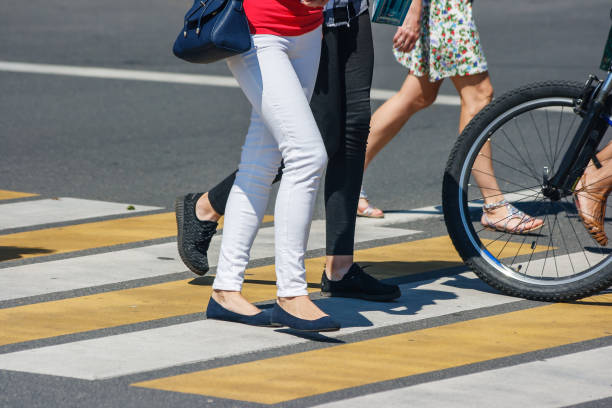 istock pedestrians at a pedestrian crossing 1137320116