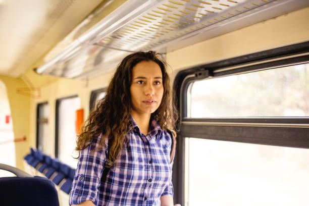 istock Young woman in train 1137321154