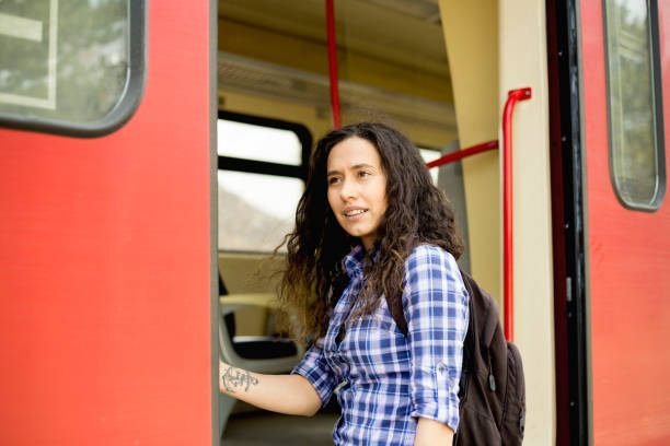 istock Girl comes into compartment from corridor of train, a trip in summer 1137321353