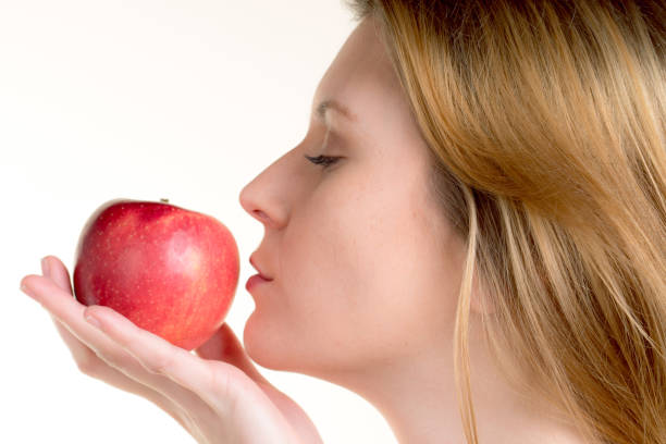istock cute girl loves her apple 1137321537
