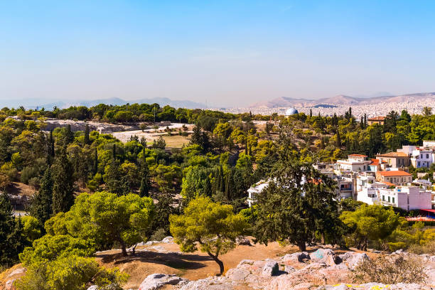 istock Athens, Greece with houses and ancient ruins 1137323625